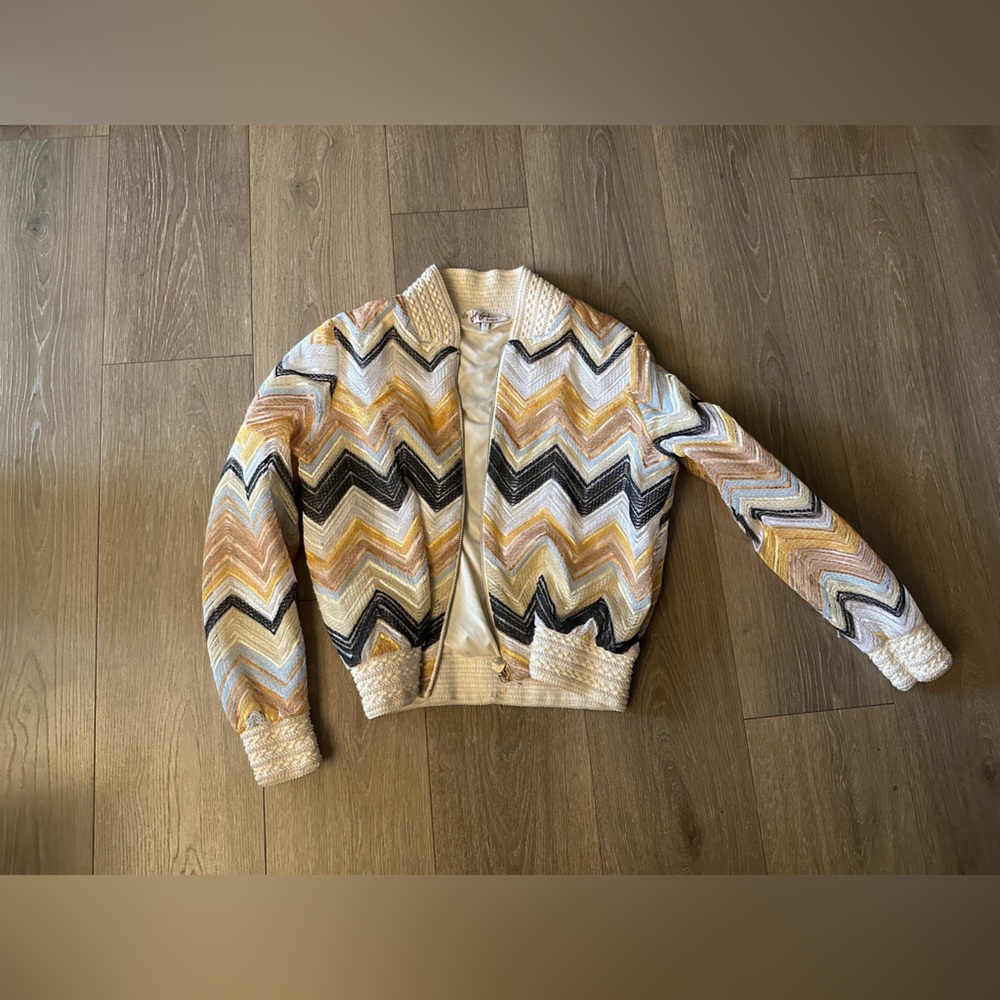 daf. Gaultier Paris 
Textured Cream and Gold Jacket chevron